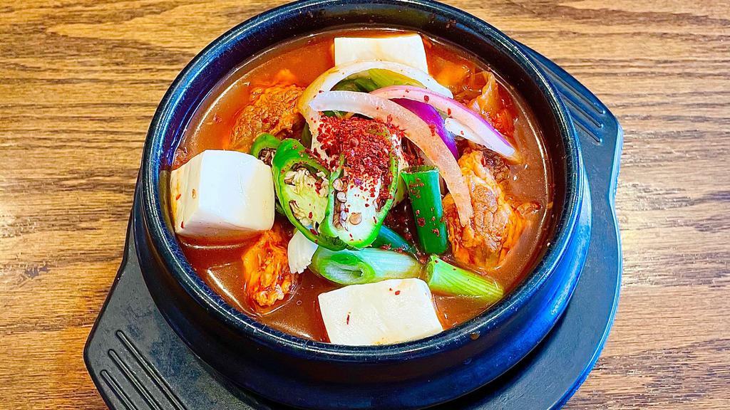 Kimchi Stew · Kimchi, pork, tofu, pepper, and onion. Spicy. Comes with Rice