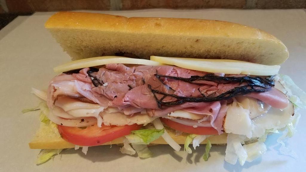 *The Traditional - Large · roast beef, shaved ham, turkey