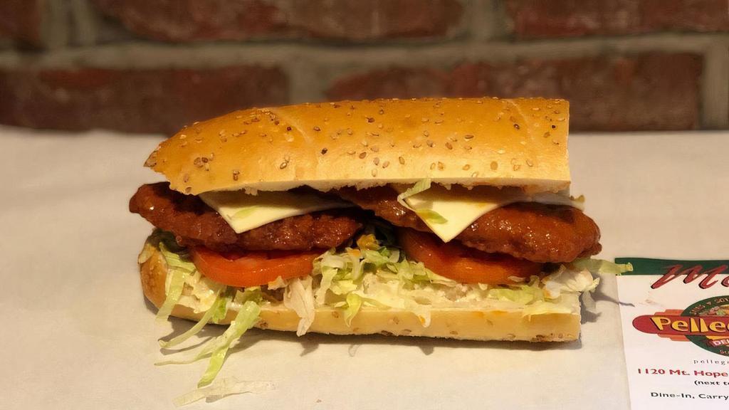 *Buffalo Chicken - Large · breaded crispy chicken, spicy buffalo sauce, american cheese, lettuce, tomatoes, bleu cheese dressing