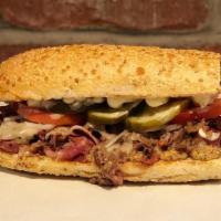 *Cuban - Large · pulled pork, ham, salami, swiss cheese, tomatoes, onions, pickles, spicy brown mustard, mayo