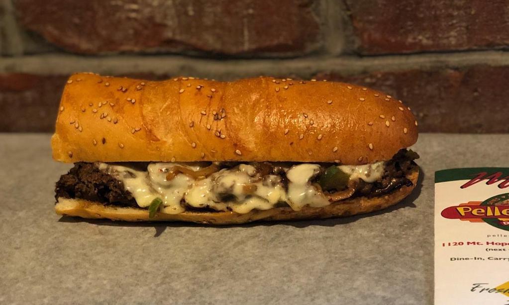 *Cheesesteak - Medium · thinly sliced usda grain-fed choice sirloin steak, grilled with peppers, onions, sautéed mushrooms and provolone cheese