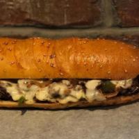 *Smoke & Fire Cheesesteak - Large · thinly sliced usda grain-fed choice sirloin steak, grilled with peppers, onions, sautéed mus...