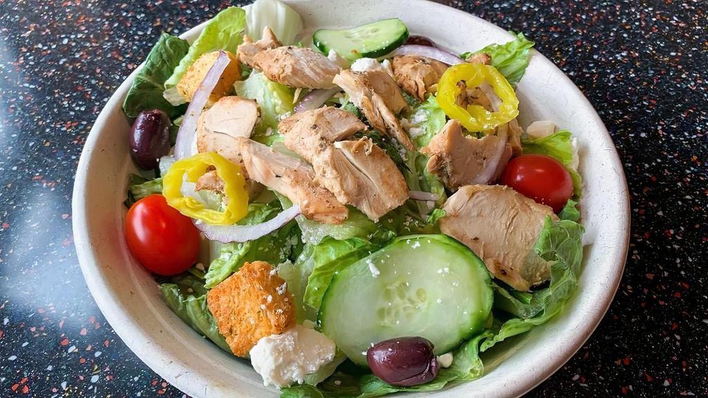 *Chicken Greek Salad · grilled sliced chicken breast, feta cheese, tomatoes, cucumbers, red onion, kalamata olives, croutons and banana pepper slices atop salad greens with red wine vinaigrette