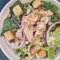 *Chicken Caesar Salad · grilled sliced chicken breast, red onion, croutons, crisp romaine lettuce tossed in a creamy...
