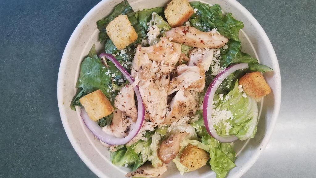 *Chicken Caesar Salad · grilled sliced chicken breast, red onion, croutons, crisp romaine lettuce tossed in a creamy caesar dressing with parmesan cheese