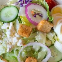 *Garden Salad · fresh crisp salad greens, tomatoes, cucumbers, red onions, feta cheese, sliced egg, croutons...