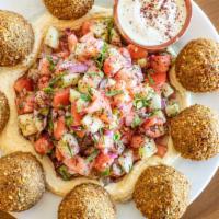 Falafel Platter · 8 falafel balls served with shepherd salad and hummus.