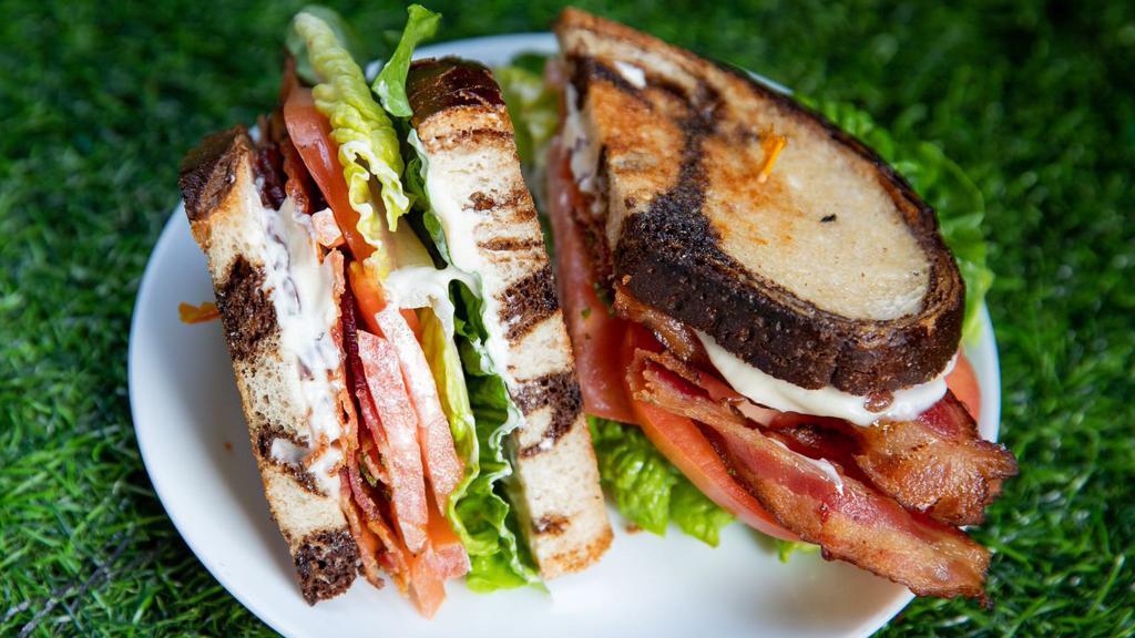 Notorious Blt Sandwich · The notorious blt! It's all good baby, baby. Bacon..... lettuce.... tomato....mayo... on fresh bread, you choose! Toasted or not.... what else do you need? You can always add some stuff and get crazy! If you don't know.... now you know.