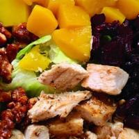 The Karma Salad · Karma police... coming for the salad. Grilled chicken, fresh mango, crisp romaine lettuce, d...