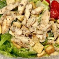 Caesar Salad · Crisp romaine tossed with croutons, Caesar dressing and grated cheese.
