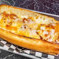 Buffalo Chicken Melt Sub · Crispy chicken in wing sauce, blue cheese, and mozzarella on a sub roll.