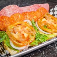 Antipasto Sub · Ham, salami, provolone cheese, lettuce, tomato, banana peppers, roasted red peppers with Ita...