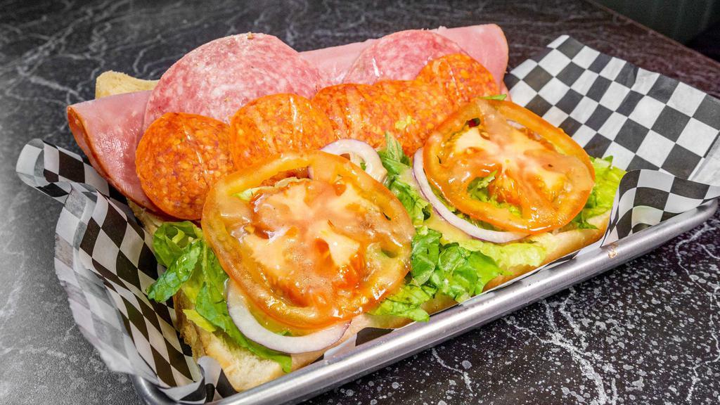 Antipasto Sub · Ham, salami, provolone cheese, lettuce, tomato, banana peppers, roasted red peppers with Italian dressing.