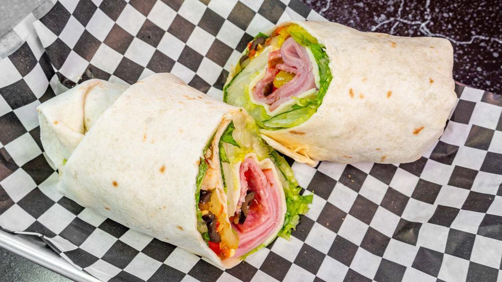 Antipasto Wrap · Ham, salami, provolone cheese, lettuce, tomato, banana peppers, roasted red peppers with Italian dressing.