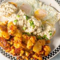 Eggs Any Style With Biscuits And Gravy
 · Any style eggs with two buttermilk biscuits, smothered in sausage gravy, topped with scallio...
