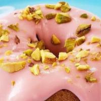 Pomegranate Pistachio Bundt (Vegan) · Individual mini pistachio speckled vanilla cake topped with a tart pomegranate glaze and cru...