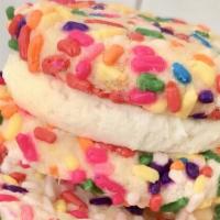 Birthday Cake Cookie · Buttah cookies coated in fun rainbow sprinkles sandwiched between vanilla American buttercre...