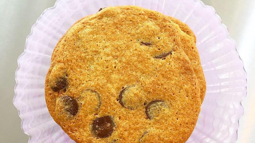 Chocolate Chip Cookie · Crisp buttahery cookie loaded with Callebaut chocolate chunks. 1 cookie.