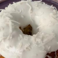 Coconut Bundt (Vegan) · Individual mini bundt vanilla coconut cake topped with a luscious coconut milk glaze + cocon...