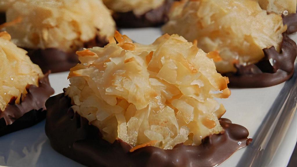 Chocolate Dipped Coconut Macaroon (Gluten-Free) · A rich coconut treat baked until golden and dipped in dark chocolate.