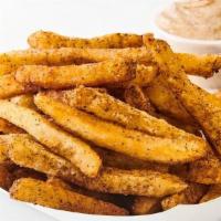Jerk Fries W/Jerk Mayo · Skin-on fries, fried to a golden crisp and dusted with our proprietary Jerk seasoning blend,...