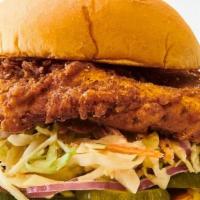 Classic Fried Chicken Sandwich · Fried chicken breast with pickles and creamy slaw.