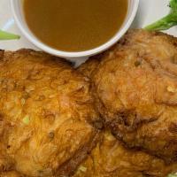 Shrimp Egg Foo Young · Served with white rice and 3 cakes.