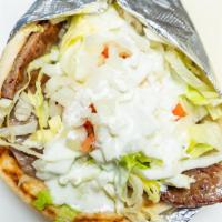Gyro · Lettuce, tomato, onion, choice of beef, chicken, lamb or falafel and gyro sauce.