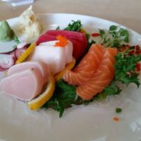 Sashimi Appetizer( 8Pcs ) · Eight pieces. Chef’s choice.