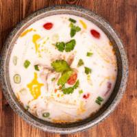 Tom Kha · Gluten-Free. White mushroom, tomato and scallion in coconut galangal broth.