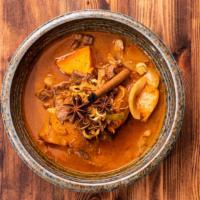 Massaman Curry · Gluten-Free. Sweet potato, onion and peanuts with coconut milk.