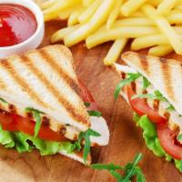 The Chicken Club Panini · Delicious Panini made with Grilled Chicken, Smoked bacon, Brie cheese, plum tomatoes, and Ho...