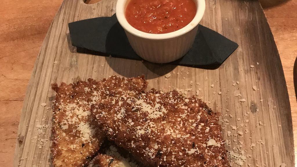 Mozzarella Wedges · Thick-sliced fresh mozzarella breaded with buttermilk and seasoned bread crumbs served with spicy marinara.
