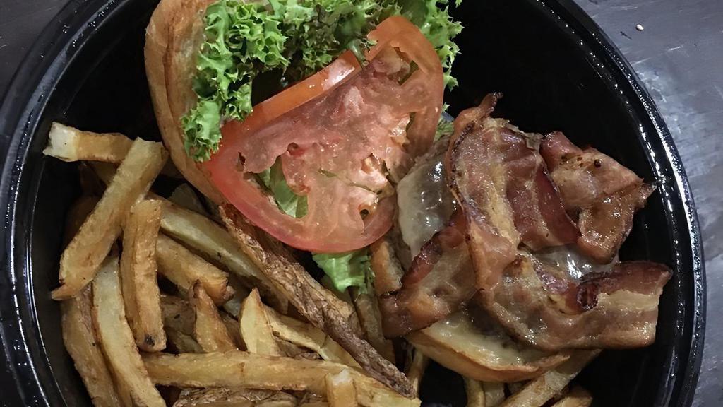 Barley House Burger · Applewood smoked bacon, cheddar, lettuce, tomato, barley sauce, and croissant bun. served with handcut fries.