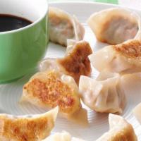 Fried Dumplings (10 Pieces)锅贴 · Ten pieces.