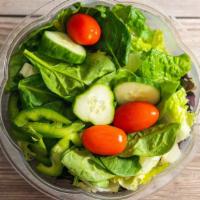 Mediterranean Salad · Romaine lettuce, tomatoes, cucumbers, onions, lemon juice, olive oil, and oregano.