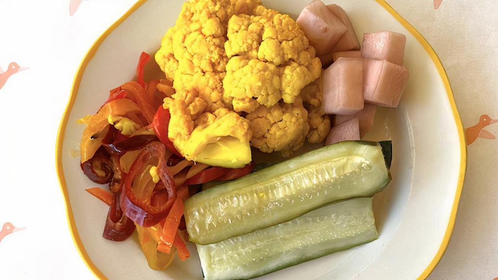 Pickle Plate · House assorted pickles (dill spears, red onions, peppers, turmeric cauliflower + seasonal veggies)