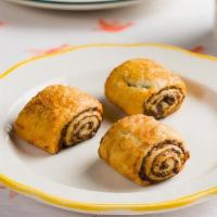 Rugelach (2 Pc) · 2 hand rolled classic rugelach filled w/ rotating jam