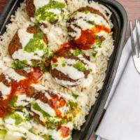  Falafel Over Rice · comes with water or soda.