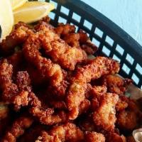 Fried Clam Strips · Lemon caper tartar sauce.