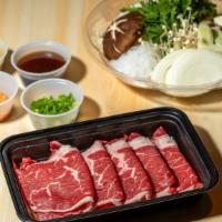 Shabu Shabu Set (Uncooked) · Sliced top rib of beef,  served with vegetables, homemade tofu in ponzu and rice or udon