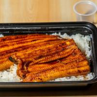 Eel Una - Ju · Broiled and steamed eel with special homemade sauce over a bed of rice .