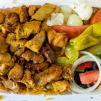 Chicken Gyro With Rice · Served with lettuce tomatoes green peppers onions olives and mix pickles.