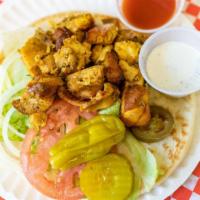 Chicken Gyro On Pita · Served with lettuce tomatoes green peppers onions olives and mix pickles.