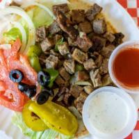 Lamb Gyro On Pita · Served with lettuce tomatoes green peppers onions olives and mix pickles.