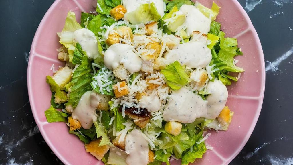 Caesar Salad · Romain Lettuce, Croutons, Parmesan Cheese, Caesar Dressing.