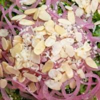 Kale Salad · Kale, Roasted Almonds, Pickled Onion, Pecorino Cheese.