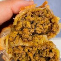 Beef Empanada · fried wheat dough stuffed with flavored ground beef