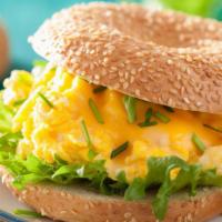 Egg And Cheese Bagel · Fresh eggs, and creamy cheese stuffed in between bagel of your choice.