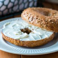 Everything Bagel With  Cream Cheese  · Fresh homemade everything bagel smothered with cream cheese.